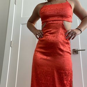 Satin long orange dress with cut outs